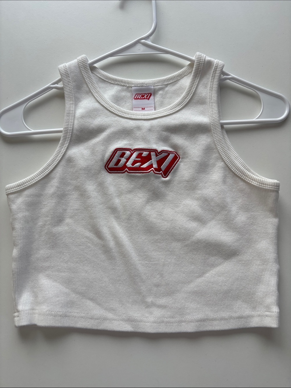 BEXI White Ribbed Crop Tank with Red Logo Patch